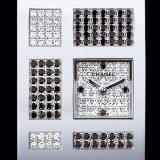 Or blanc 18 carats / Cadran pavé diam 4 diam. noirs