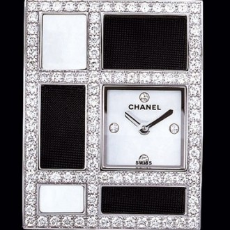 Or blanc 18 carats / Cadran nacre, 4 diamants