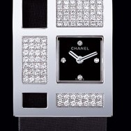 Or blanc 18 carats / Cadran noir 4 diamants