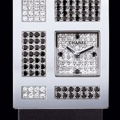 Or blanc 18 carats / Cadran pavé diam 4 diam. noirs